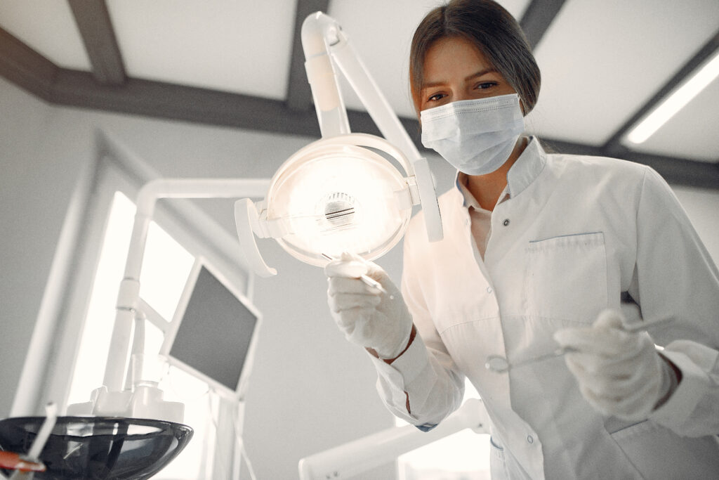 Dentist Preparing Dental Instruments