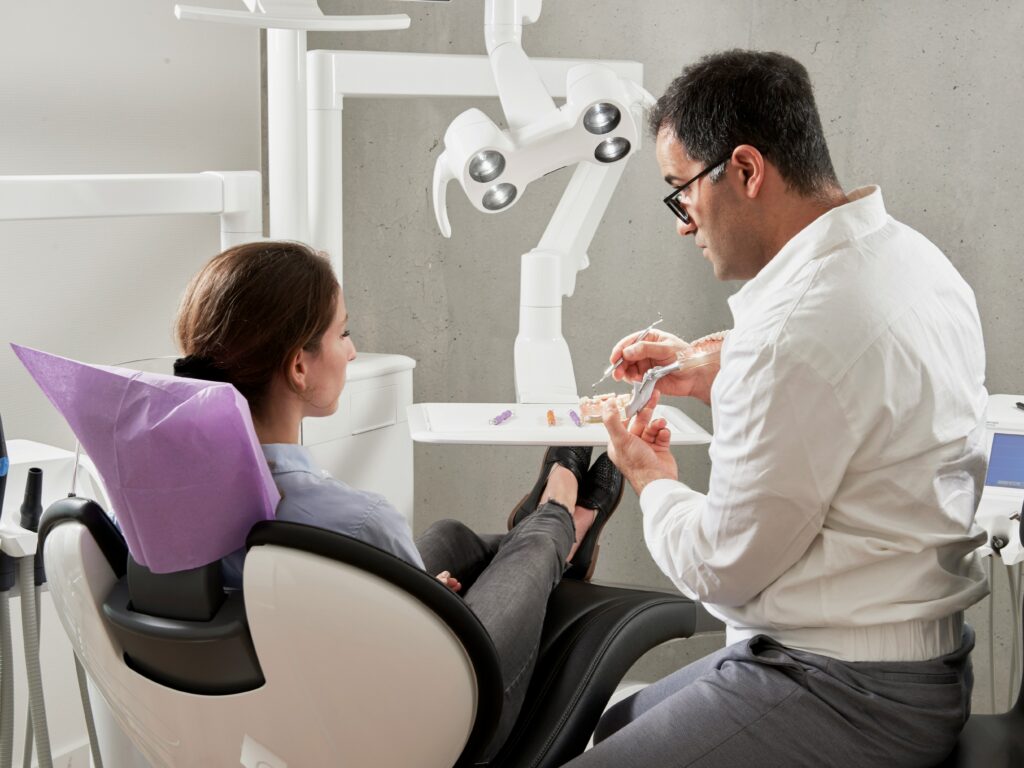 Dentist Explaining Treatment to Patient